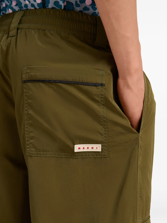 Close up of green pants, showing texture of the Polyamide fabric