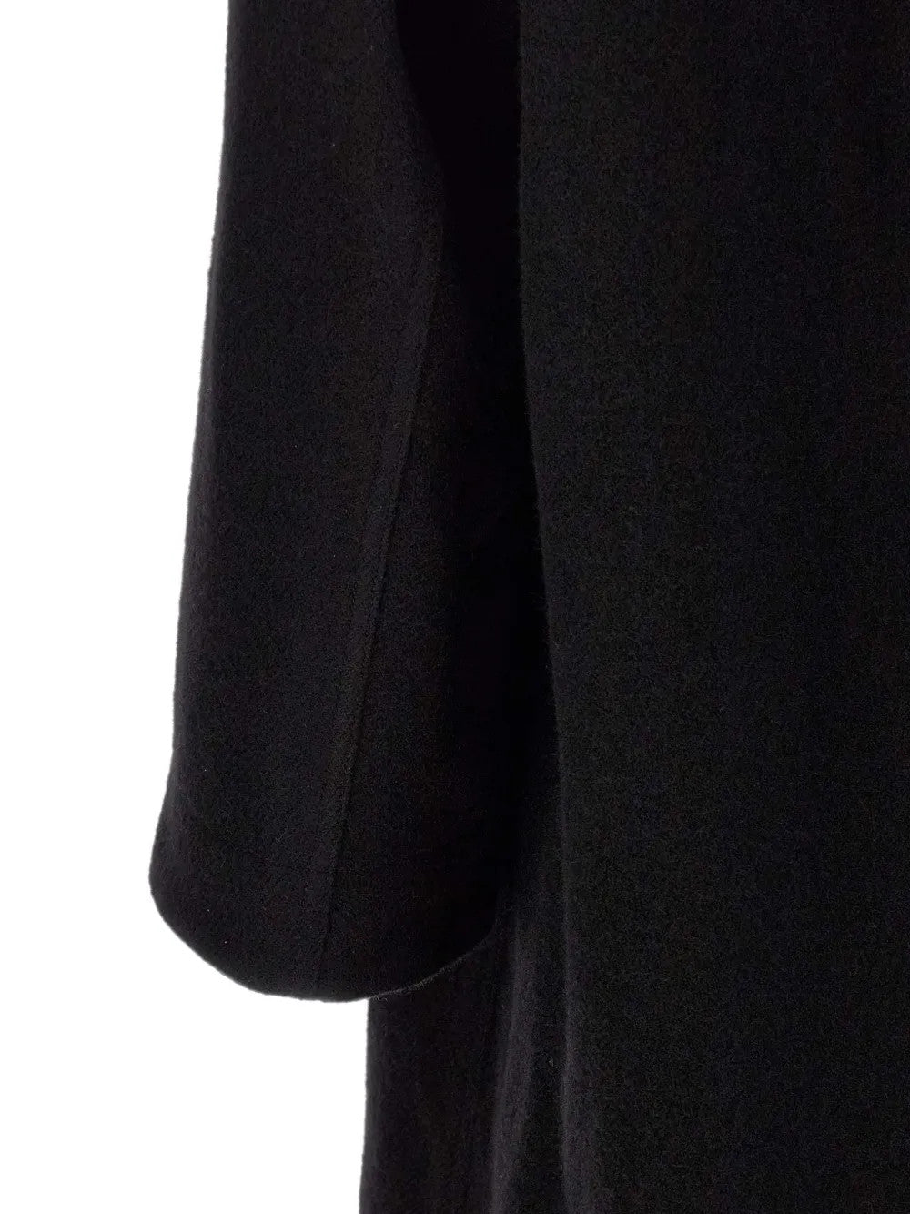 Close up of Black jacket, showing texture of the 100% virgin wool made fabric