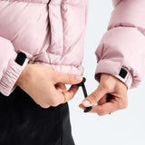Pink jacket worn by a person, showing the jacket fit