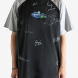 Black t-shirt worn by a person, showing the t-shirt's fit