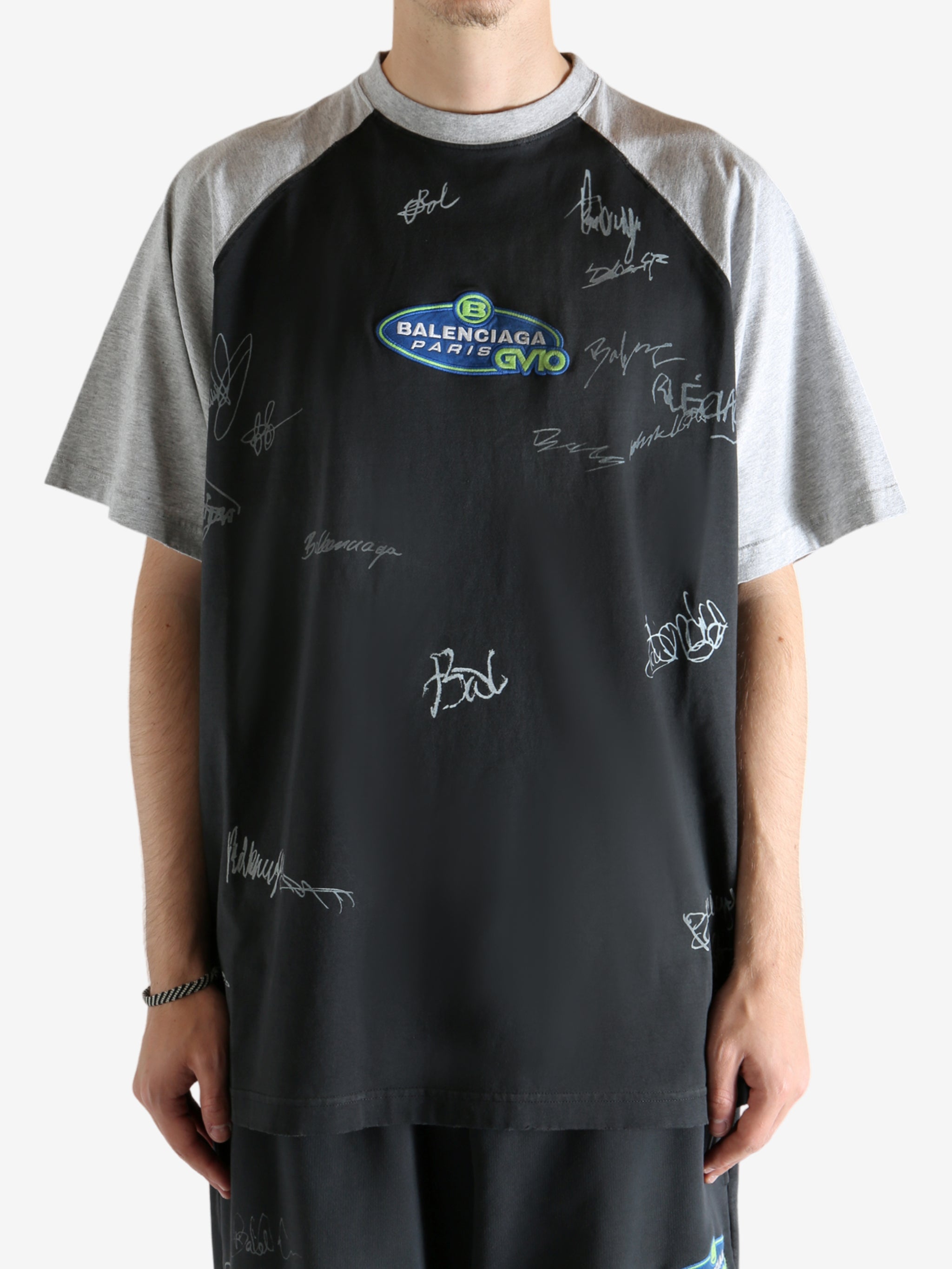 Black t-shirt worn by a person, showing the t-shirt's fit