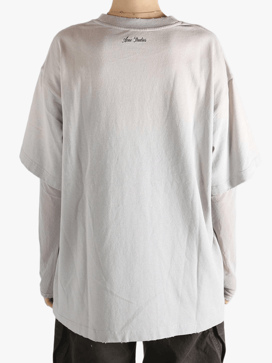 Grey T-shirt worn by a person, showing the T-shirt's fit