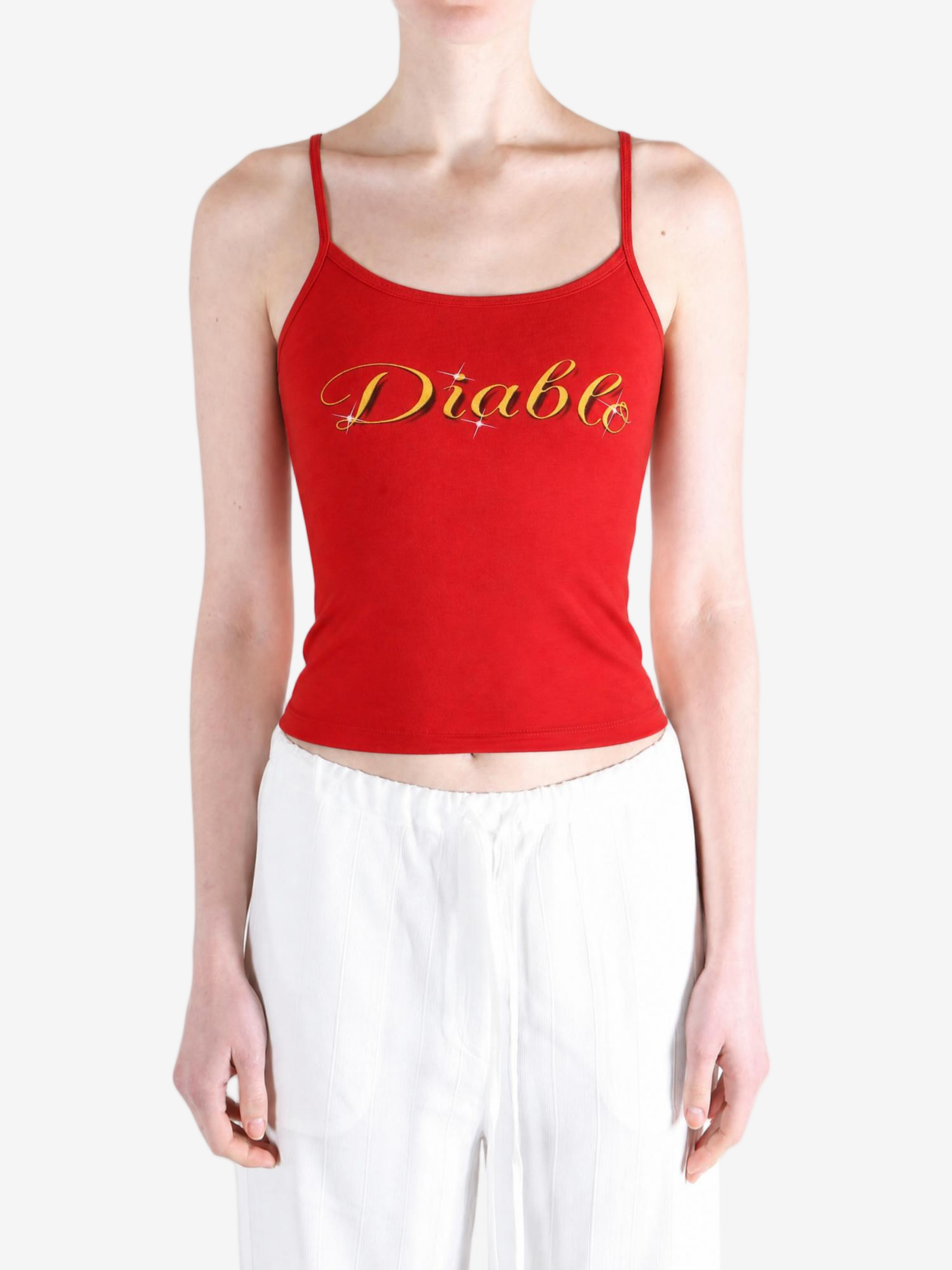 Red top worn by a person, showing the top fit