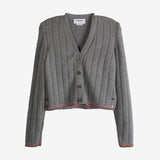 Grey knitwear, front view