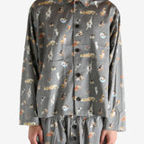 Grey pajama worn by a person, showing the pajama's fit