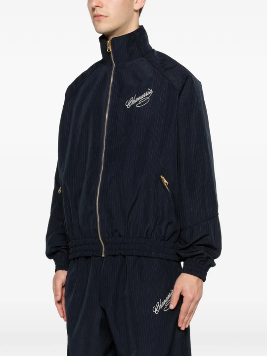 Blue jacket worn by a person, showing the jacket's fit