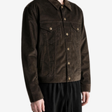 Brown jacket worn by a person, showing the jacket fit