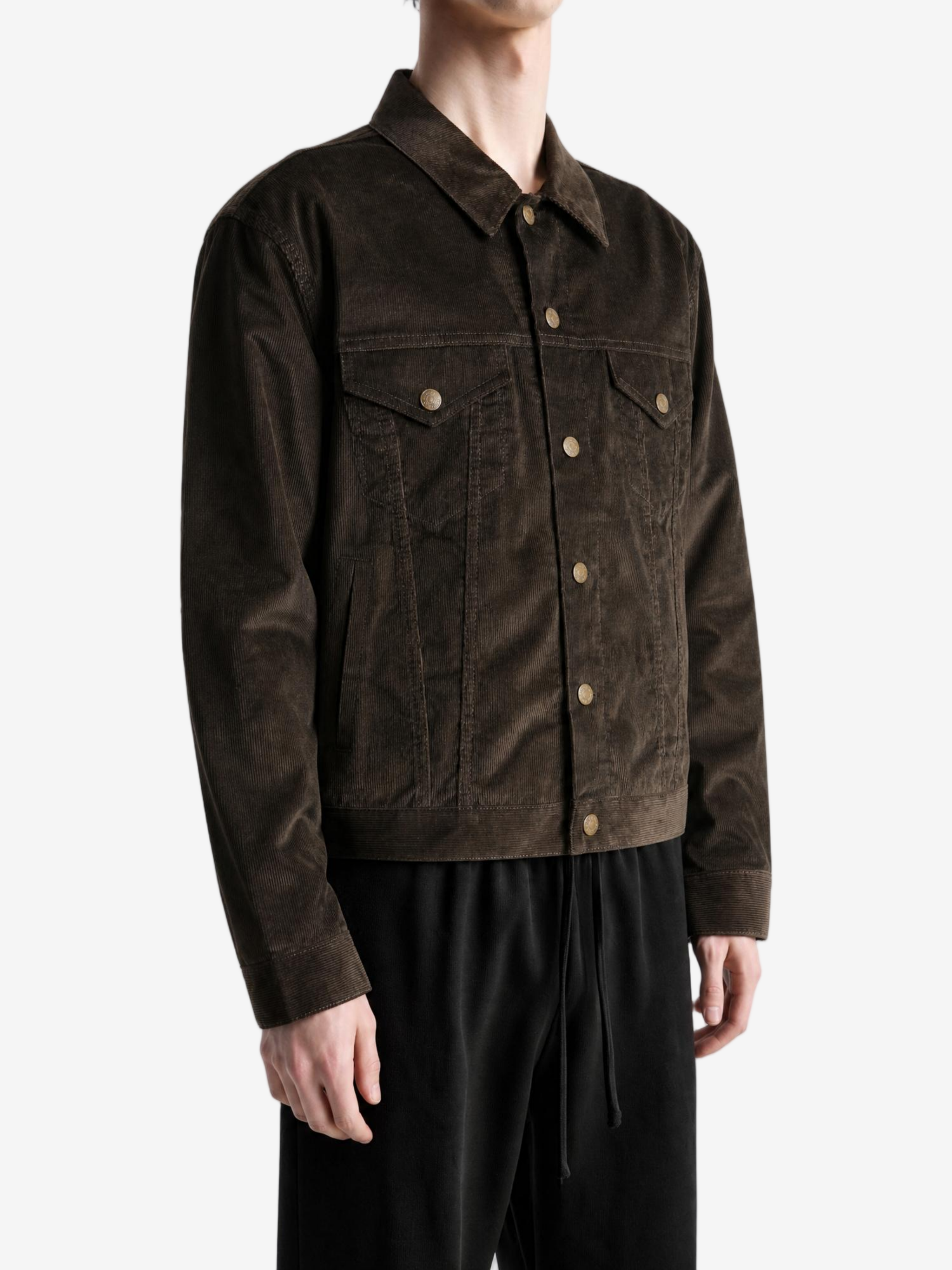 Brown jacket worn by a person, showing the jacket fit