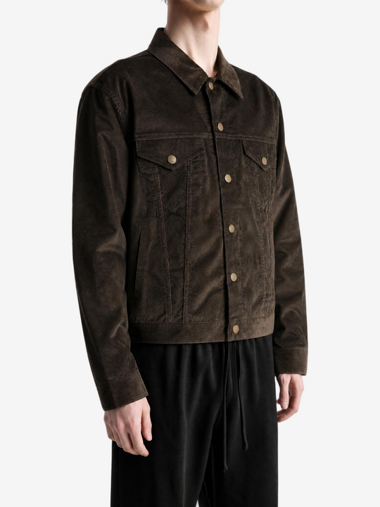 Brown jacket worn by a person, showing the jacket fit