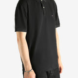 Black T-shirt  worn by a person, showing the T-shirt's fit