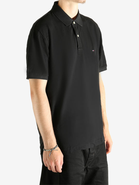 Black T-shirt  worn by a person, showing the T-shirt's fit
