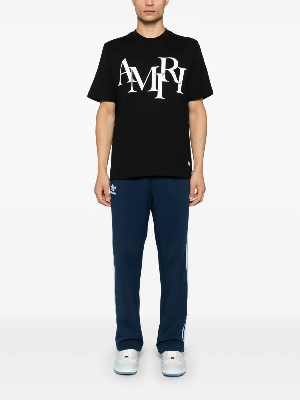 Black t-shirts, full body view