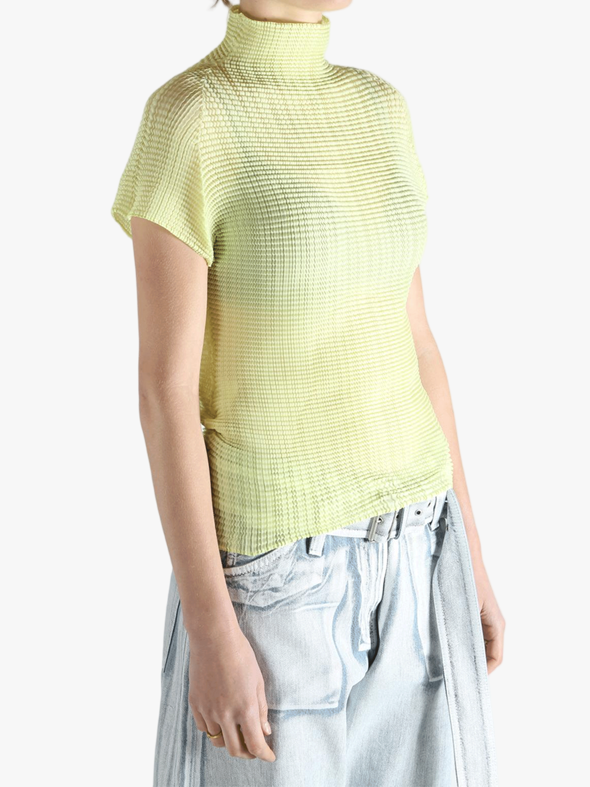 Yellow shirt worn by a person, showing the shirt's fit