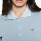 Blue top worn by a person, showing the top fit