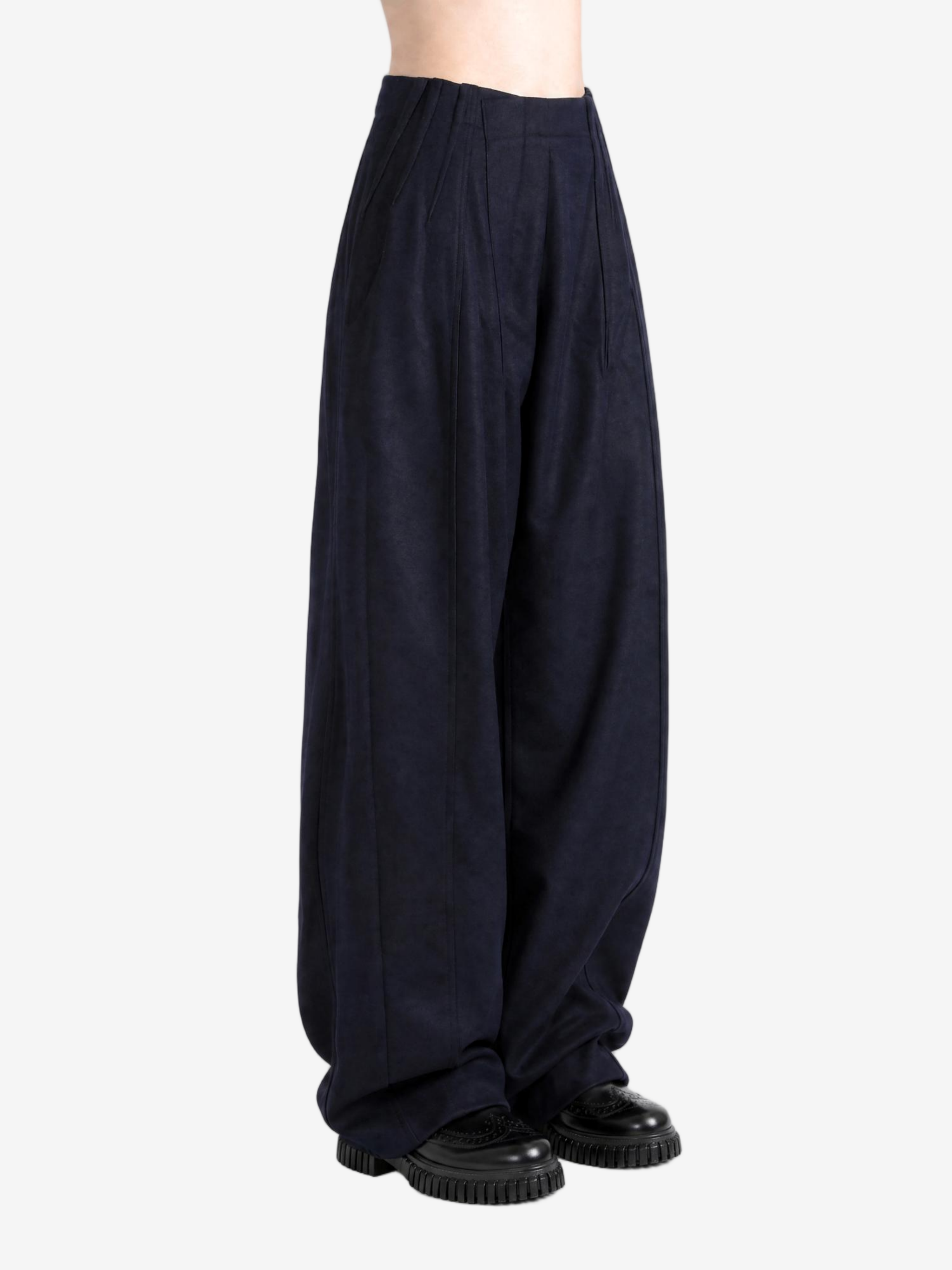 Navy pants worn by a person, showing the pants fit