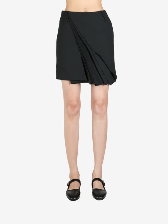 Black skirt worn by a person, showing the skirt's fit