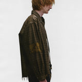 Brown shirts worn by a person, showing the shirts fit