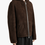 Brown jacket worn by a person, showing the jacket fit