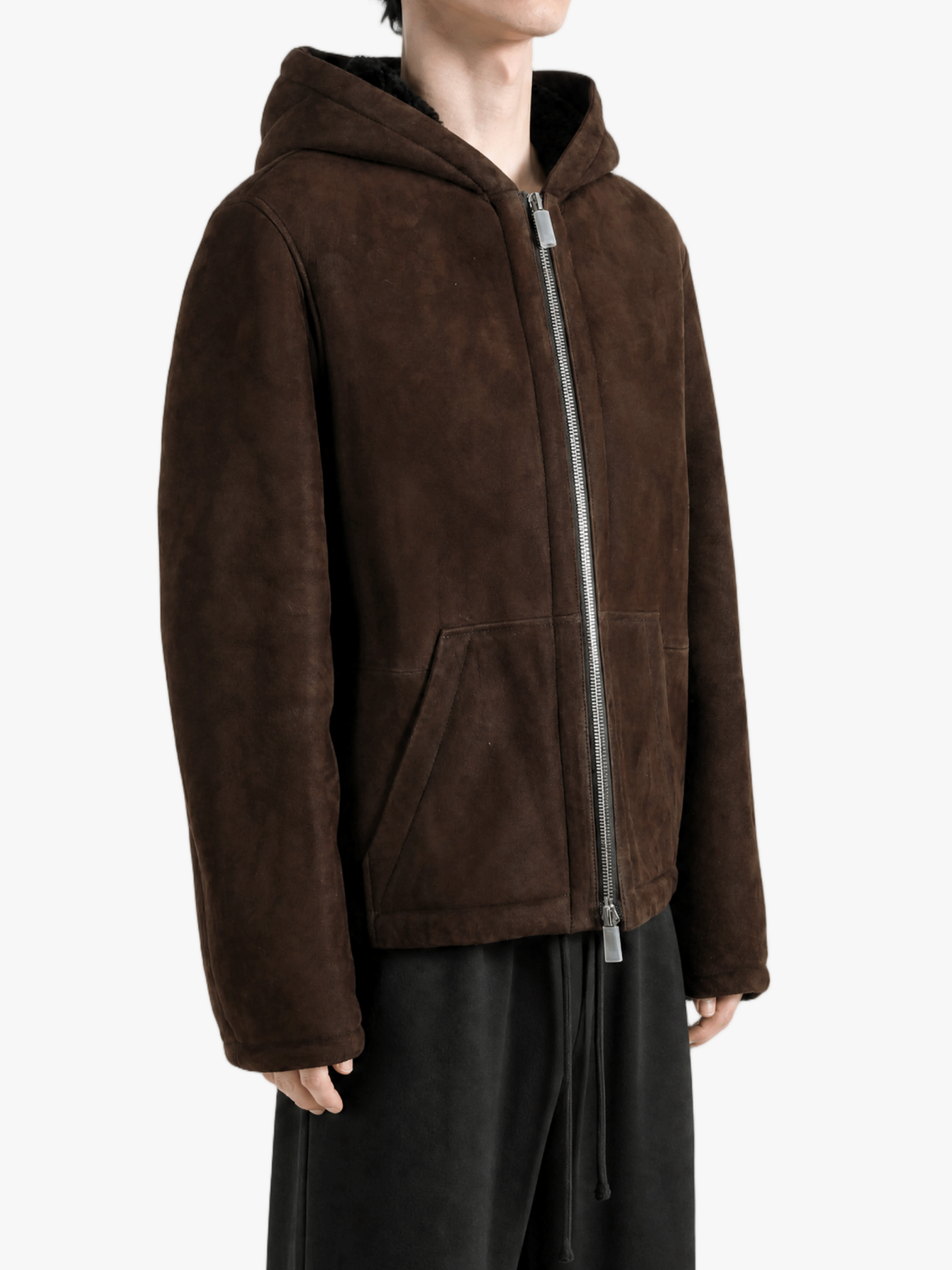 Brown jacket worn by a person, showing the jacket fit