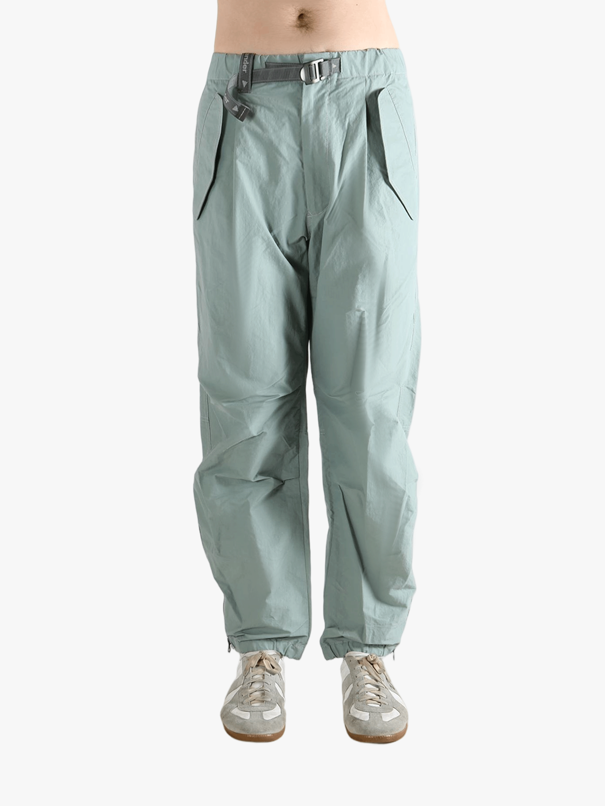 Blue pants worn by a person, showing the pants's fit