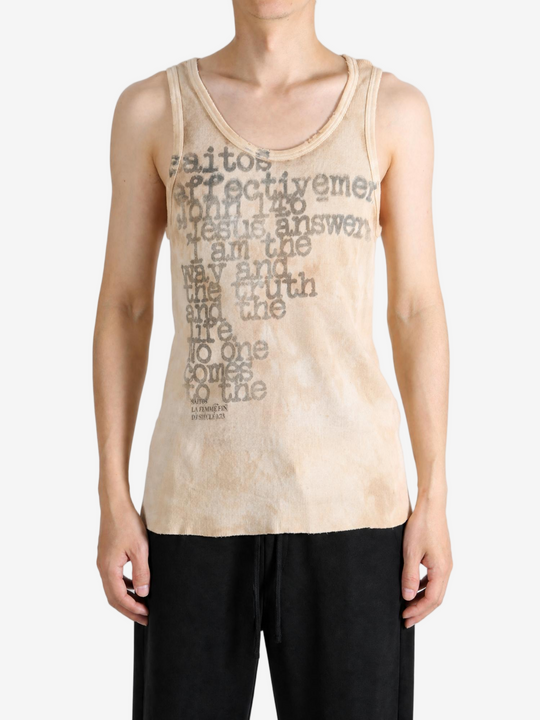 Tan t-shirt worn by a person, showing the t-shirt fit