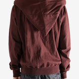 Red Hoodie worn by a person, showing the hoodie‘s fit