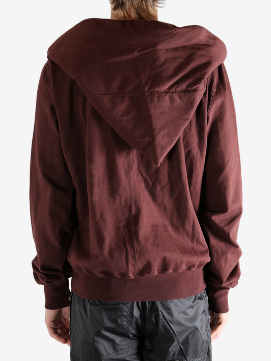 Red Hoodie worn by a person, showing the hoodie‘s fit