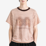 Pink t-shirt worn by a person, showing the t-shirt fit