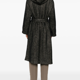 Black coat  worn by a person, showing the coat's fit