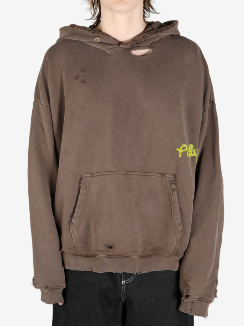 Brown sweatshirt worn by a person, showing the sweatshirt fit