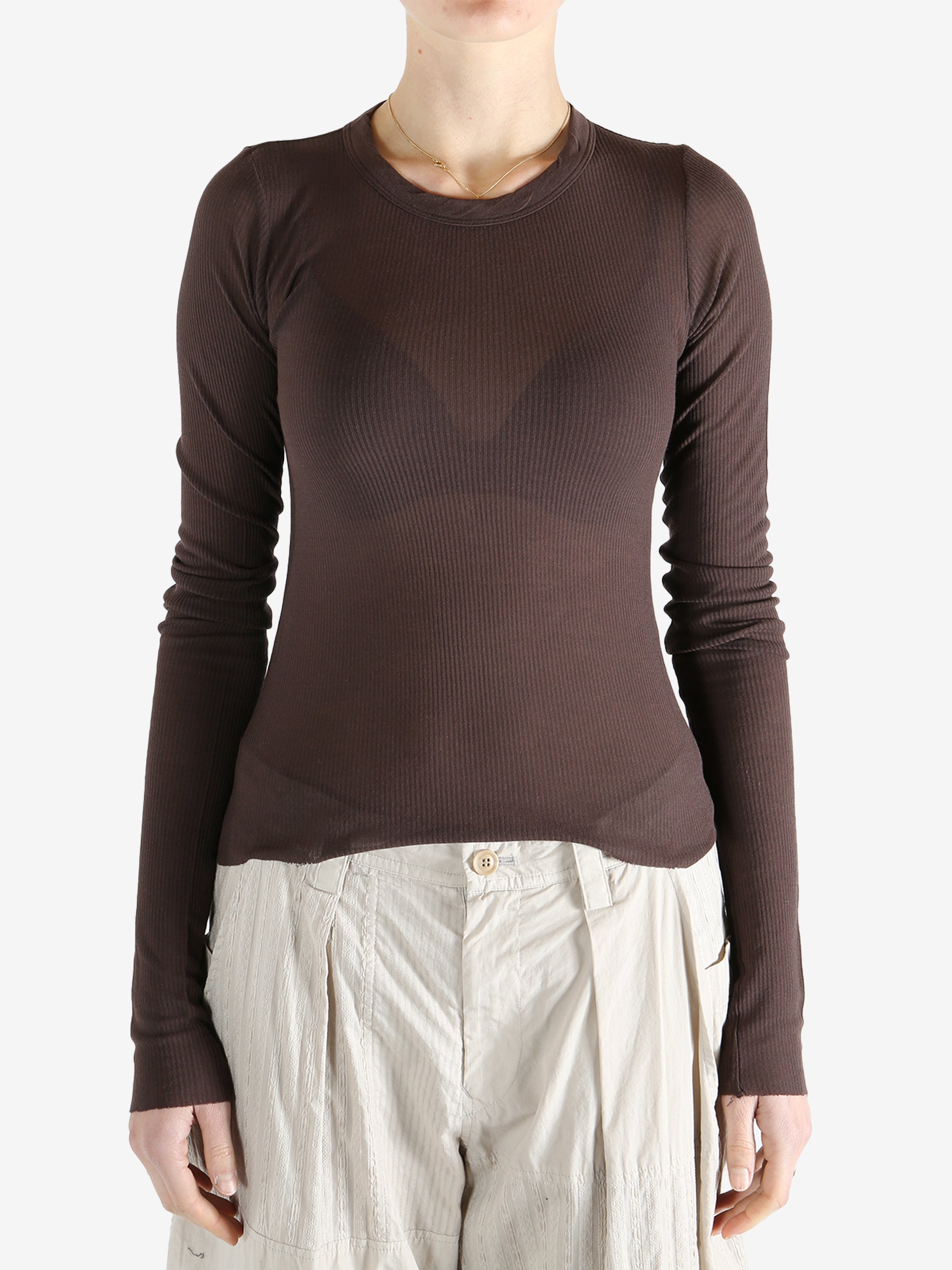 Brown t-shirt worn by a person, showing the t-shirt's fit