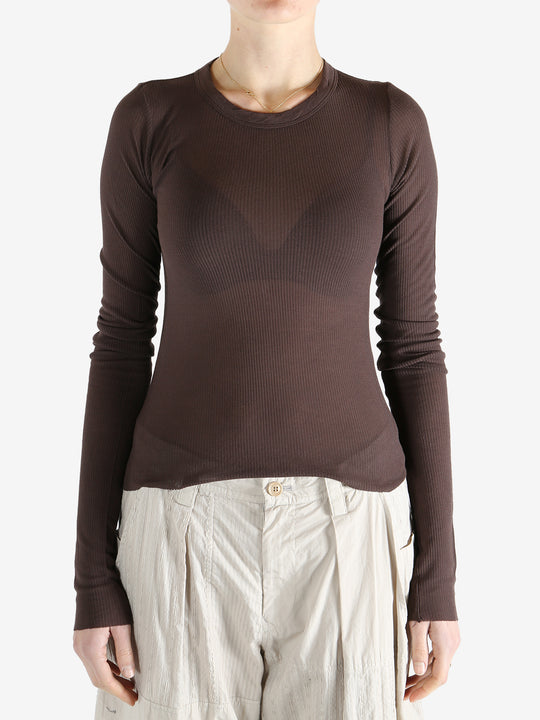 Brown t-shirt worn by a person, showing the t-shirt's fit
