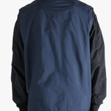 Blue tops worn by a person, showing the tops fit