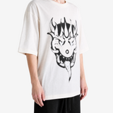 Tan t-shirt worn by a person, showing the t-shirt fit
