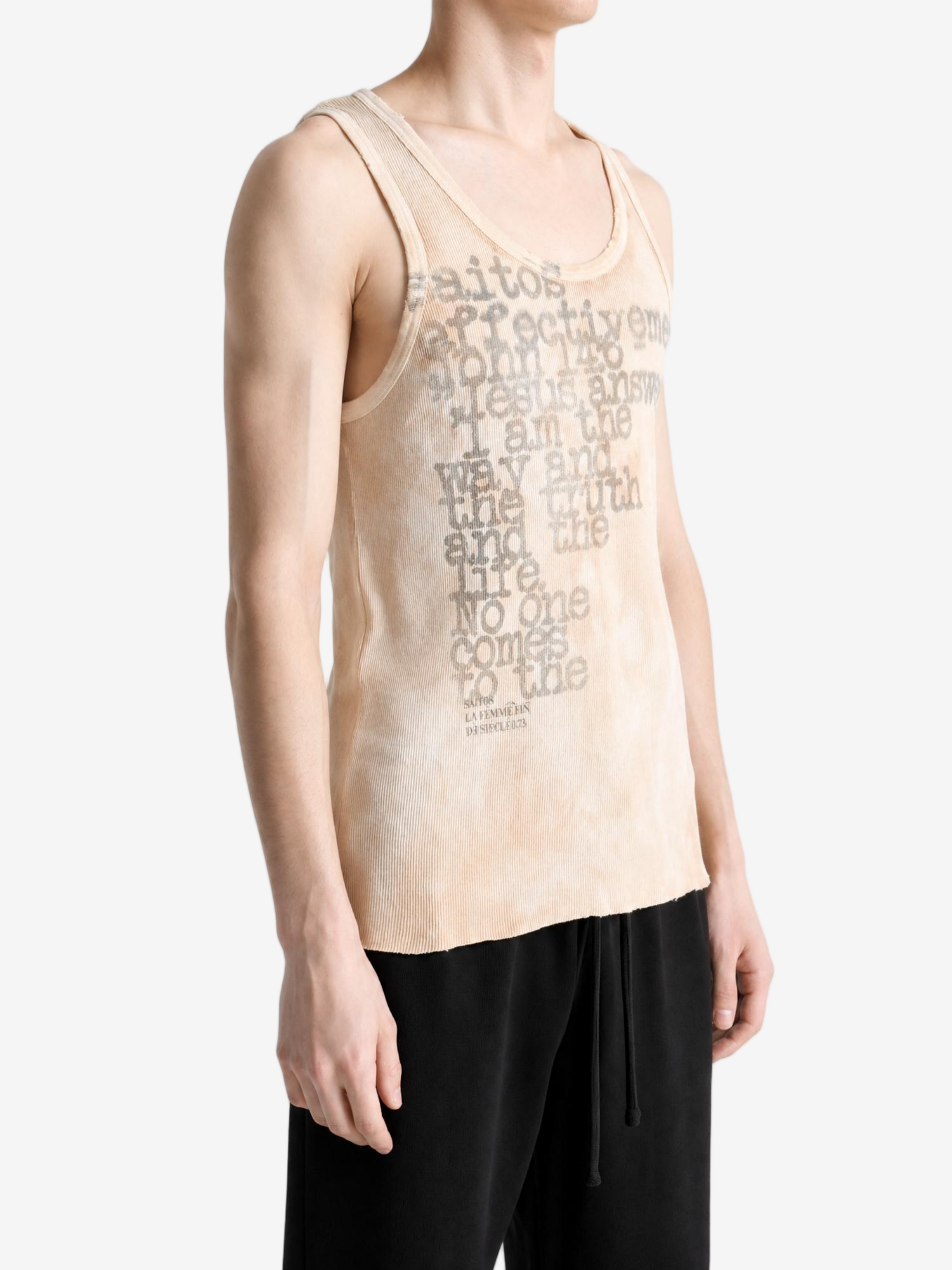 Tan t-shirt worn by a person, showing the t-shirt fit