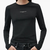 Black t-shirt worn by a person, showing the t-shirt fit