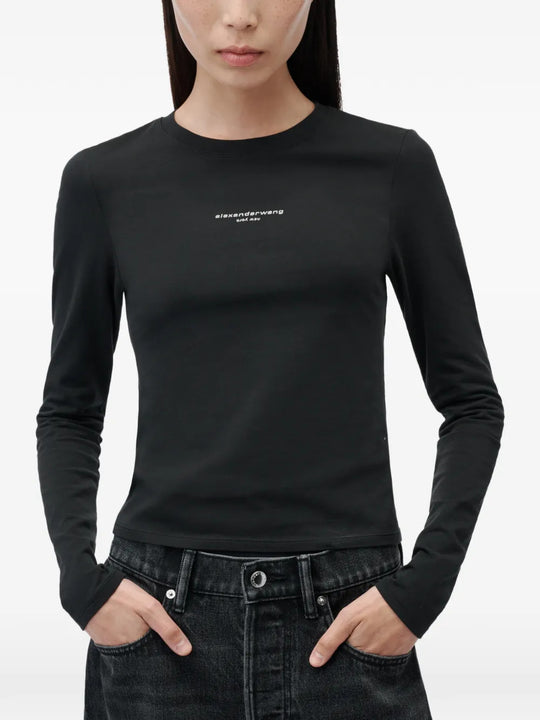 Black t-shirt worn by a person, showing the t-shirt fit