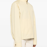 Tan skirt worn by a person, showing the skirt'fit