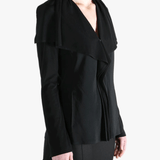 Black jackets worn by a person, showing the jackets fit