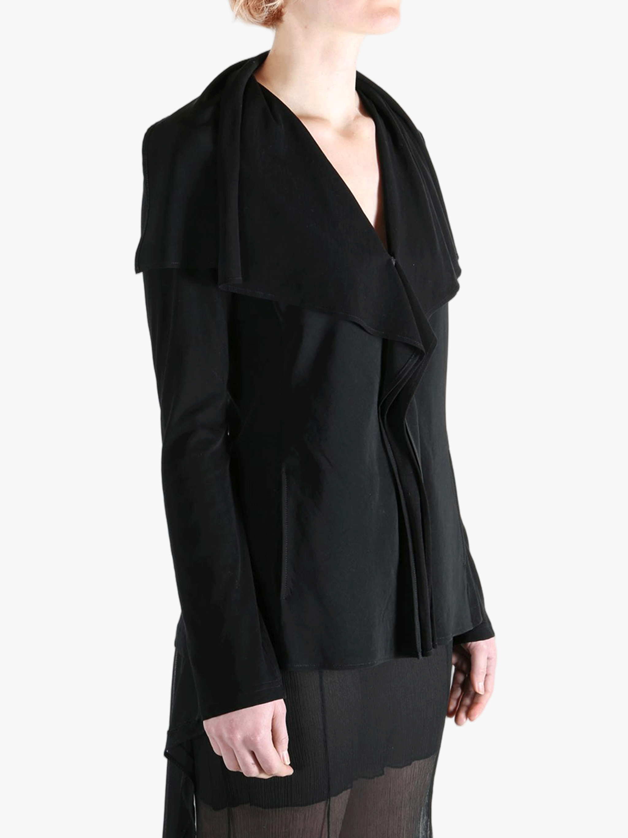 Black jackets worn by a person, showing the jackets fit