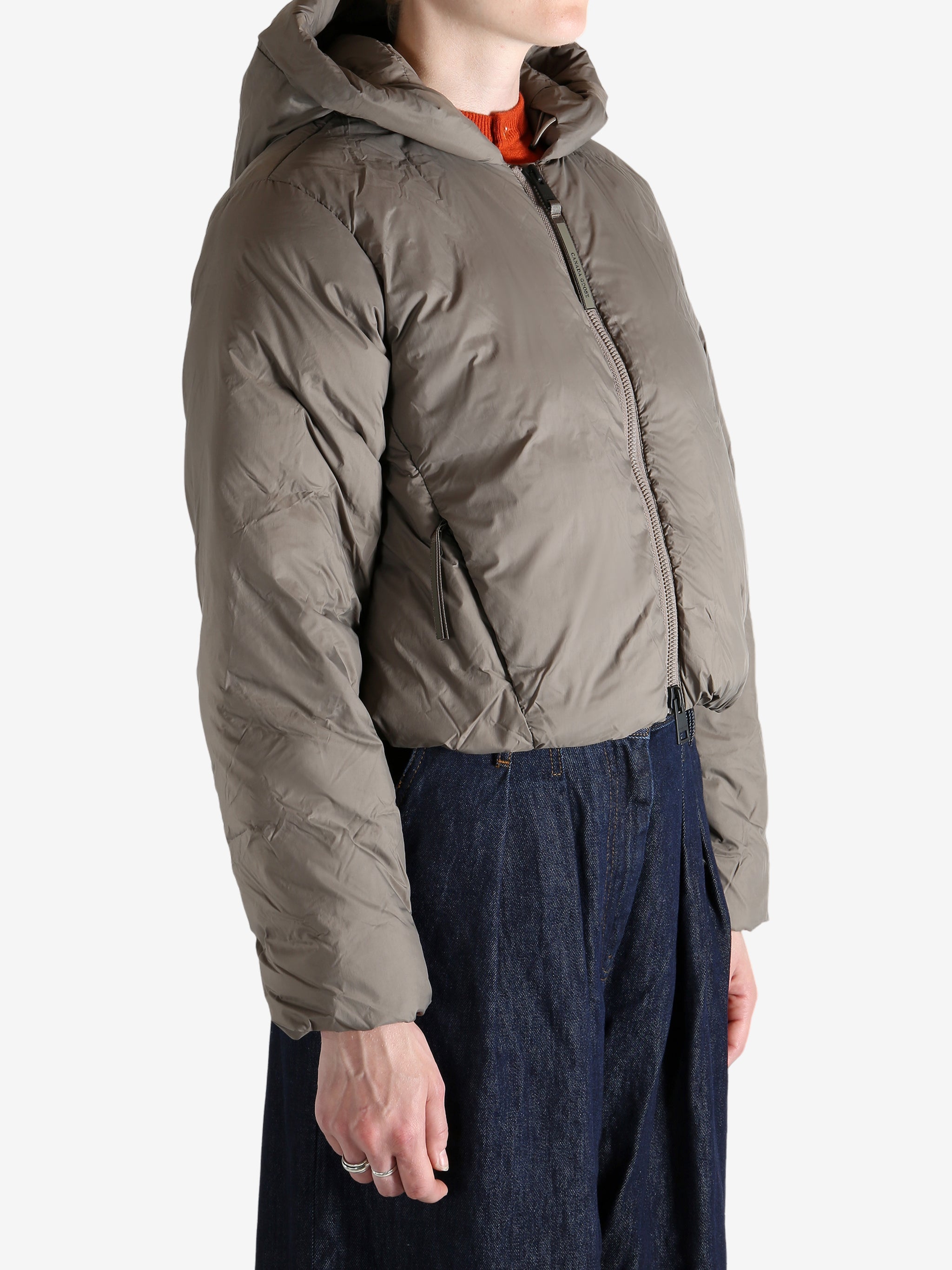 Grey jacket worn by a person, showing the jacket's fit