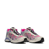 Pink sneakers, side view