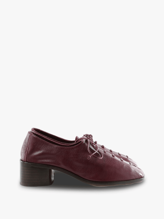 Burgundy shoes, side view