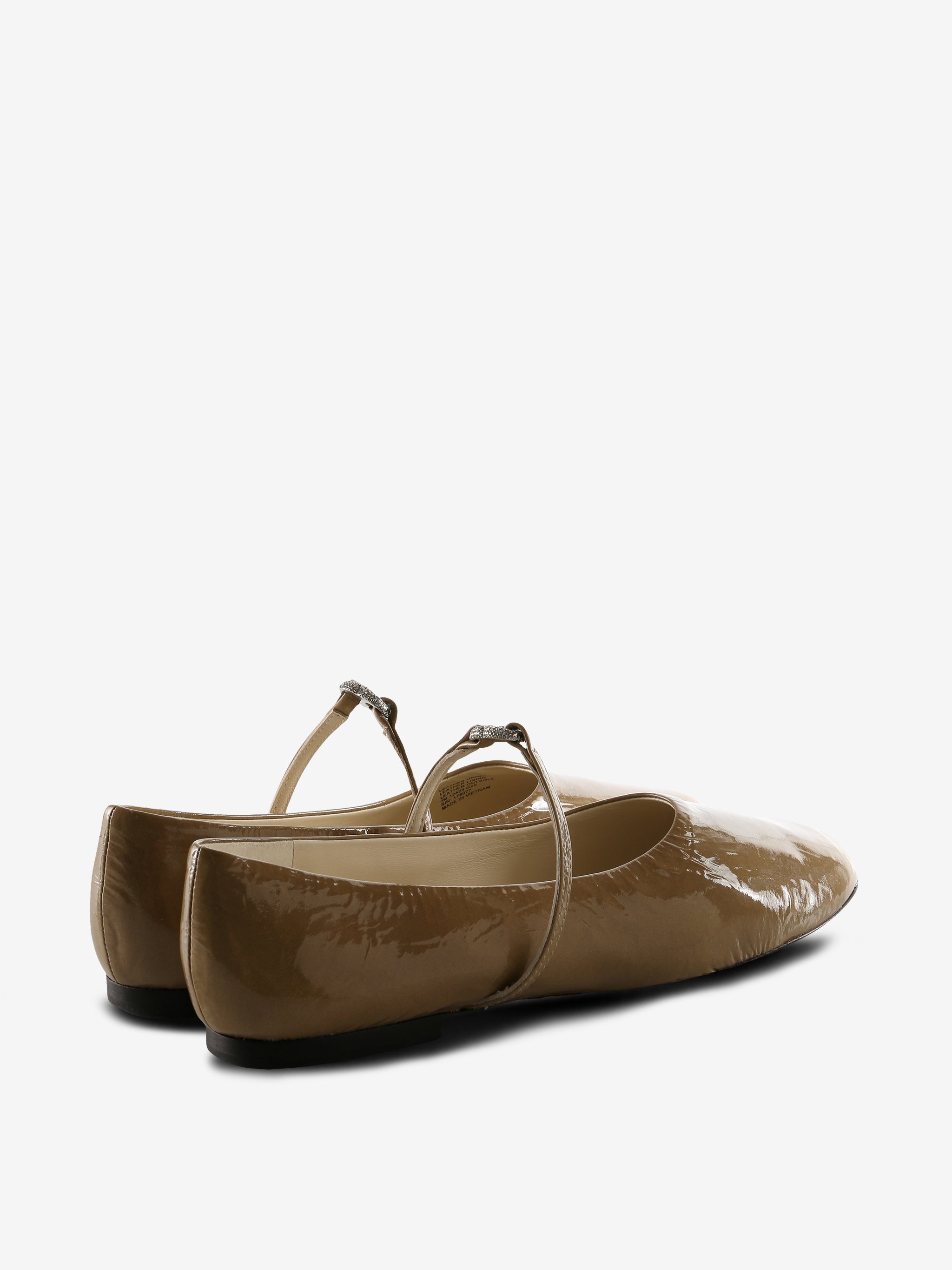 Tan flats, back view