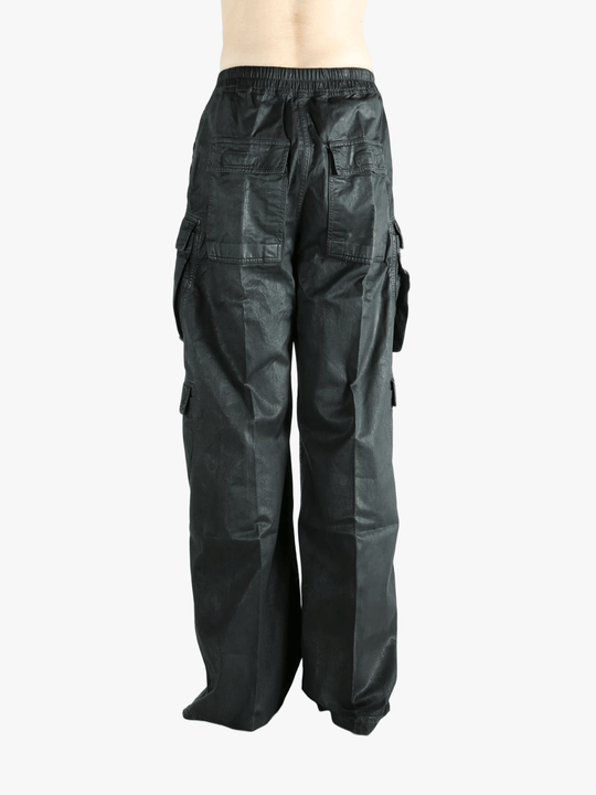 Black pant worn by a person, showing the cotton fit