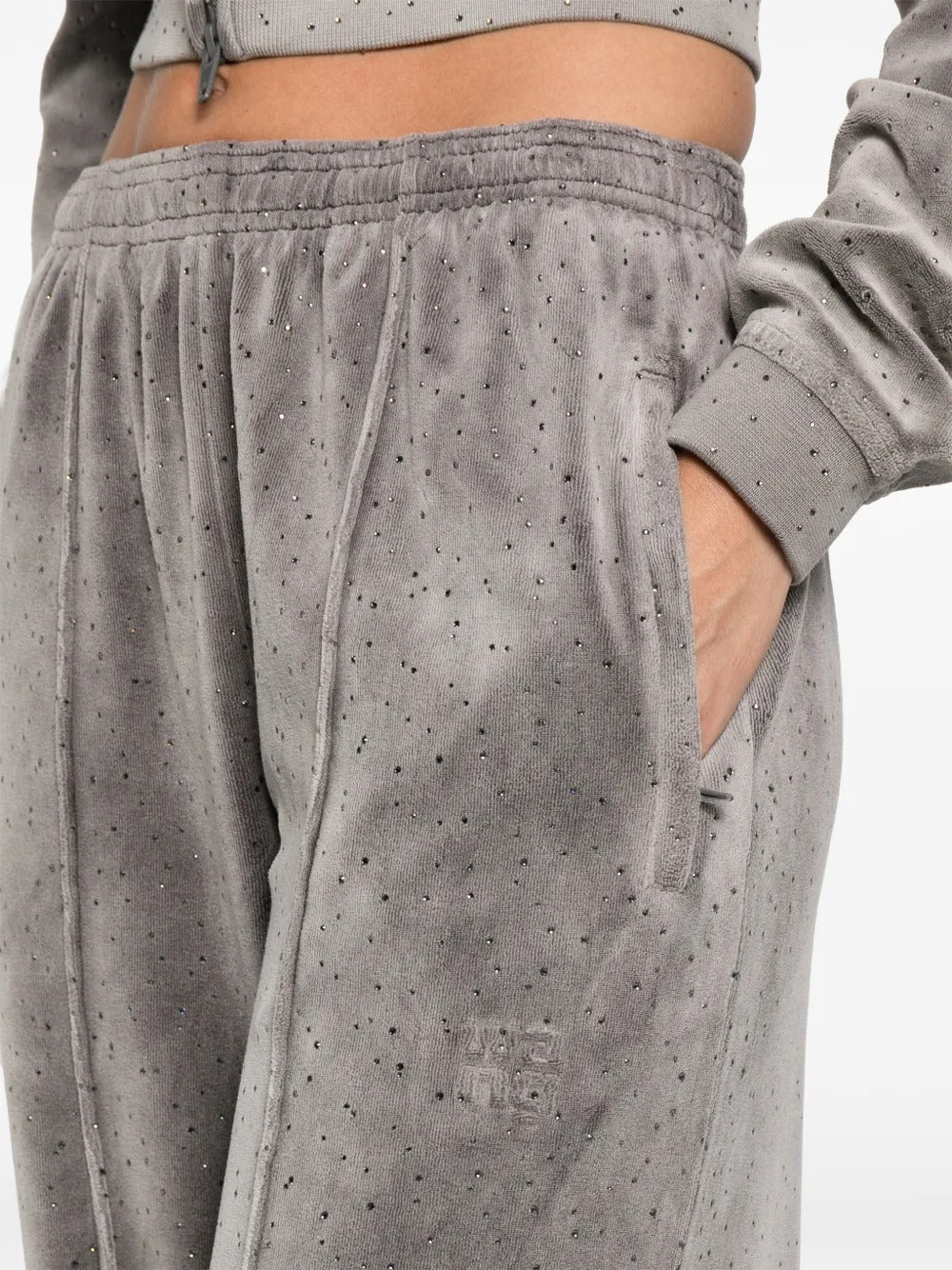 Close up of the grey pants, showing texture of the cotton fabric