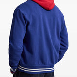 Blue jacket worn by a person, showing the jacket fit