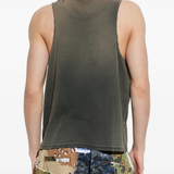 Black top worn by a person, showing the top fit