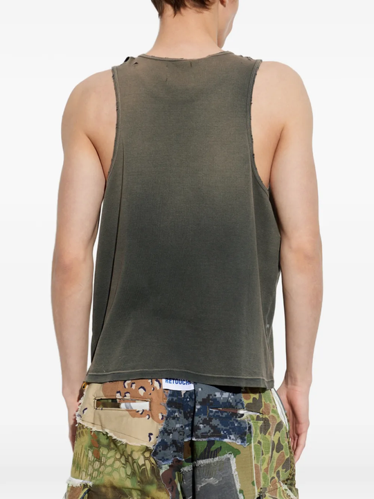 Black top worn by a person, showing the top fit