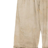 Close up of Tan pants, showing texture of the 100% linen fabric